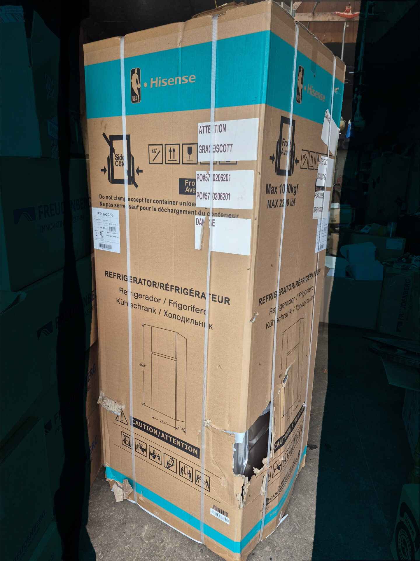 12 cubic foot stainless fridge in box with door damage see pictures for verification