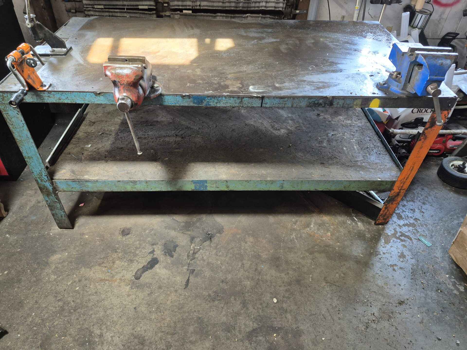 Workbench with two vices chain riveter and chain breaker