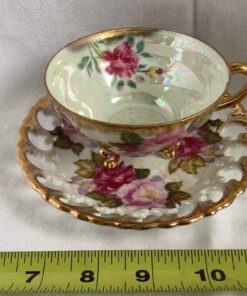 Shafford 3 footed cup and saucer