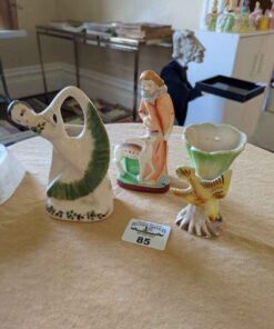 Trio of ceramic figural miniature plant pots