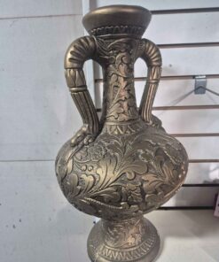 gold colored vase