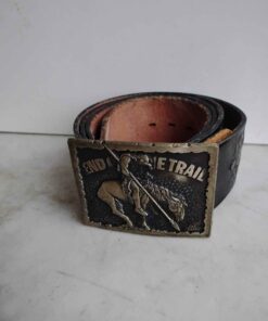 End of the trail leather belt on buckle