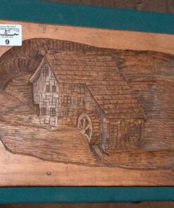 R.H Dumouchel relief carved wall hanging