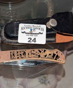 Ornately decorated pocket knife with case