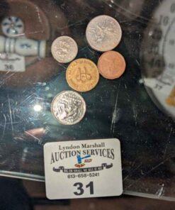 Assorted coins and token