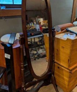 Dark wood self standing oval mirror