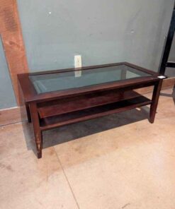 Glass topped coffee table