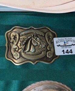 Horse head belt buckle