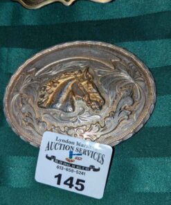 Horse head oval belt buckle