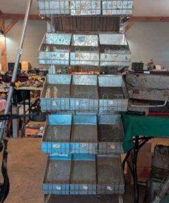 Multi tiered metal rack with metal baskets