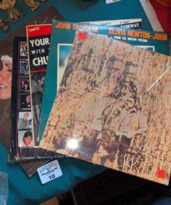 Michael Jackson, Olivia Newton John, etc record albums
