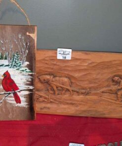 Cardinal painting on wood and relief carving