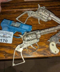 Young Buffalo Bill & Assorted Toy pistols
