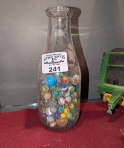 Dairy bottle of marbles