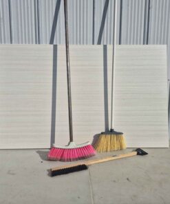 2 brooms and 1 snow scraper