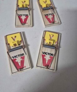 Set of 4 victor mouse traps.