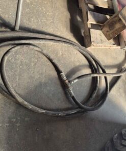 Approximately three quarter inch hose with tee etc