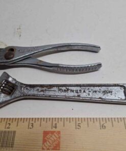 Adjustable wrench and slip joint pliers