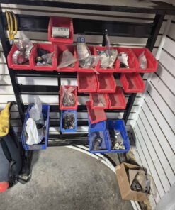 Parts storage rack with bins and hardware