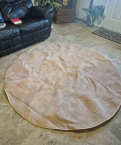 Beige round rug