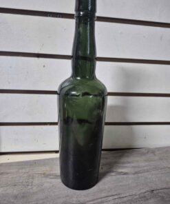 Hand blown colored glass bottle