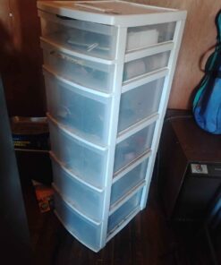 Six drawer storage unit with content