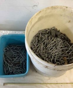 Small bucket of fence staples