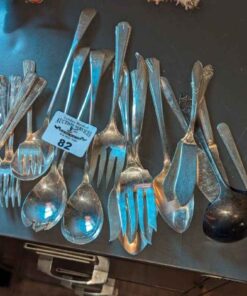 Monarch plate and assorted flatware