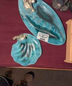 Curling figure pottery ash trays
