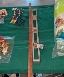 "Brockville Greatest Store" meter stick and level