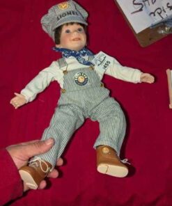Porcelain "Lionel" engineer Doll