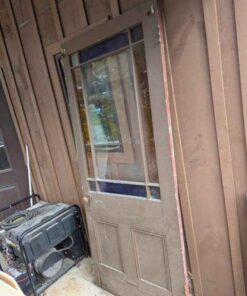 Antique wood door with stain glass inserts