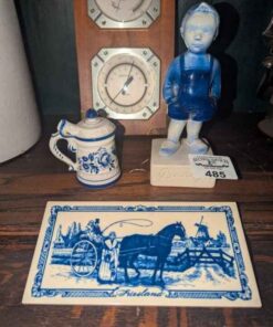 Delft statue, plaque and mini stein