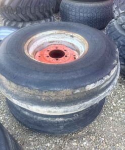 Pair of 10.00 16 tires on 6 bolt wheels