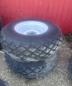 Pair of Goodyear 16.9 24 tires on Newholland 8 bolt wheels
