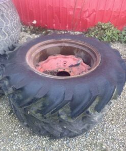 Pair of 12.4 24 tires on 8 bolt wheels