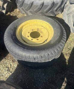 Pair of 7.00 -18 tires on 8 bolt wheels
