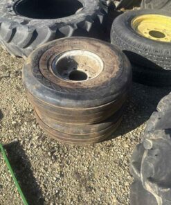 Pair of 9.00-10 tires on 6 bolt wheels