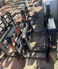 One unused maple side 5500pound skid steer quick tach pallet fork