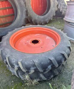 Pair of Kubota 9.5 32 tires with rims 6bolt