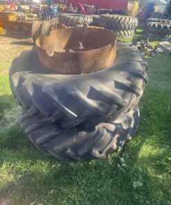 Pair of 14.9 28 tires with duals and hardware