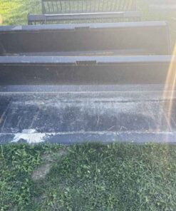 Unused 84in skid steer quick tach material bucket