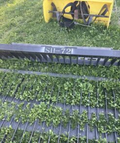 Unused 72in skid steer quick tach stone fork