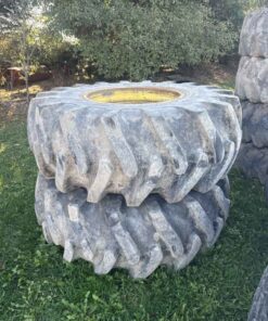 Pair of 24.5 - 32 forestry Tires on John Deere 8 bolt wheels (off Jd 7410)