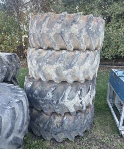 Stack of 4 tires on Rims off Jd 7410