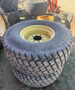 Pair of 18.00-20 tires on Jd 8 bolt wheels