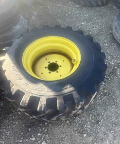 15x19.5 titan tire on 6 bolt Jd wheel
