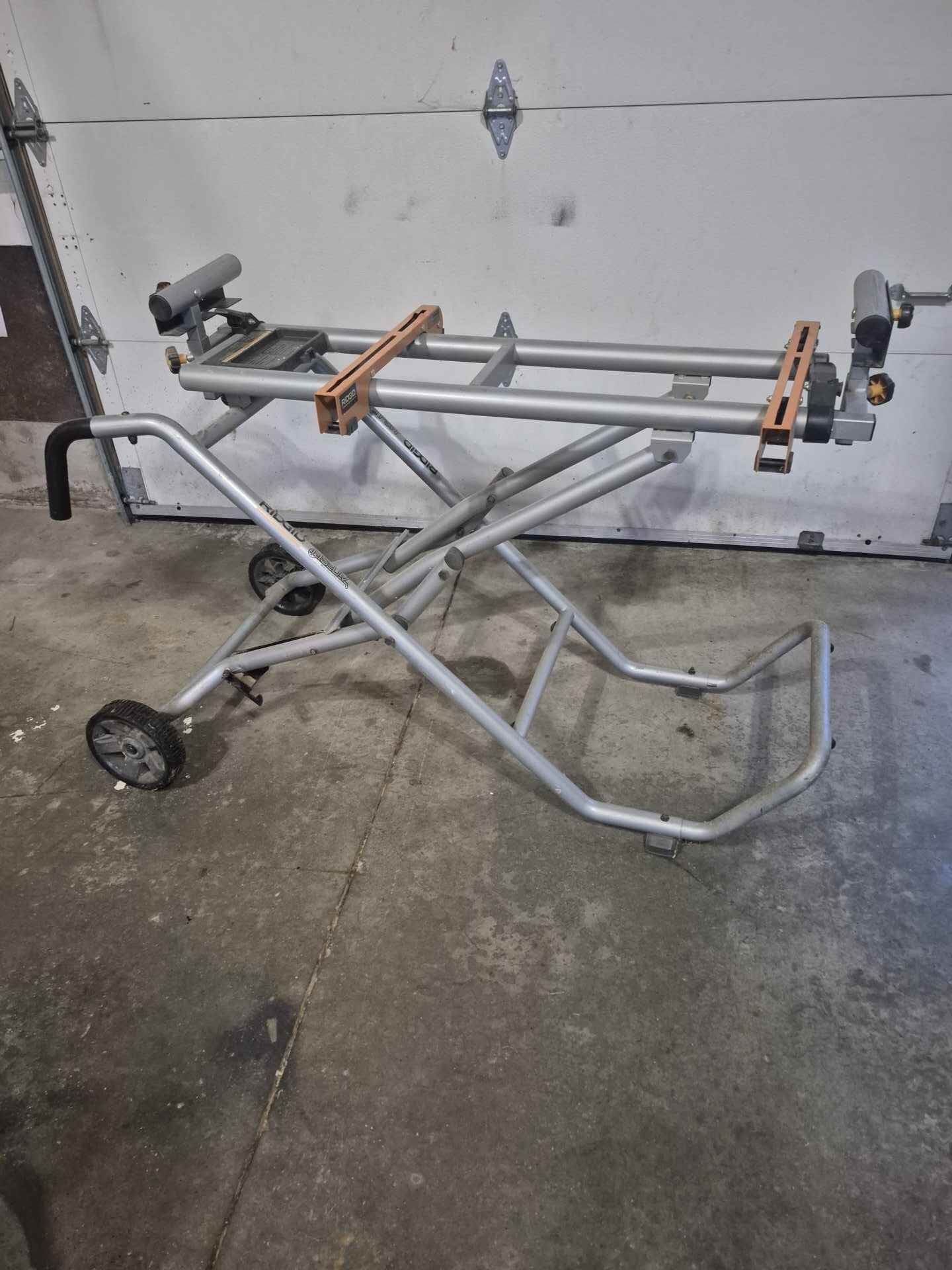 Folding miter saw stand