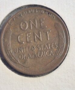 1952 wheat penny NOTE COLOUR VARIATION IN RIGHT CORNER AND ERROR IN WORD ONE