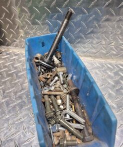 Hardware blade spindle spark plug in long blue parts bin